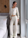 Cropped Button Cardigan & Fold-Over Waist Wide-Leg Knit Pants Set in Ivory — full-length front view on model