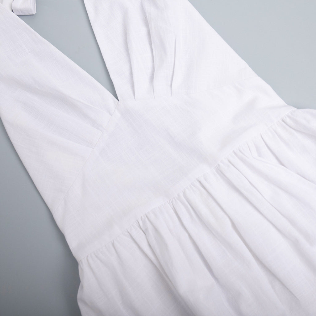 Cotton Halter V-Neck Maxi Dress in White — close-up of the pleated waist
