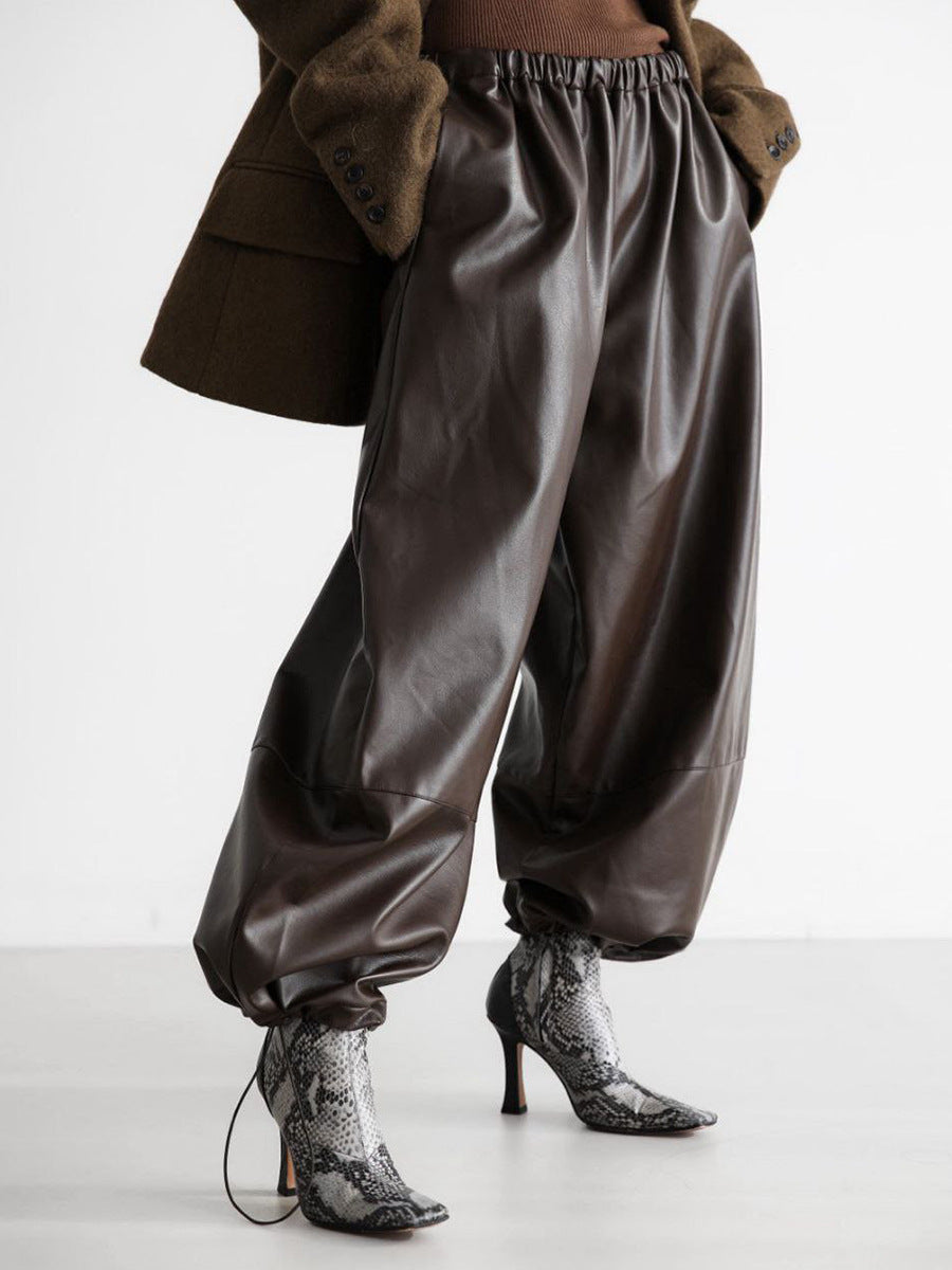 Faux Leather Balloon Pants with Drawstring Ankles in Dark Brown — on model