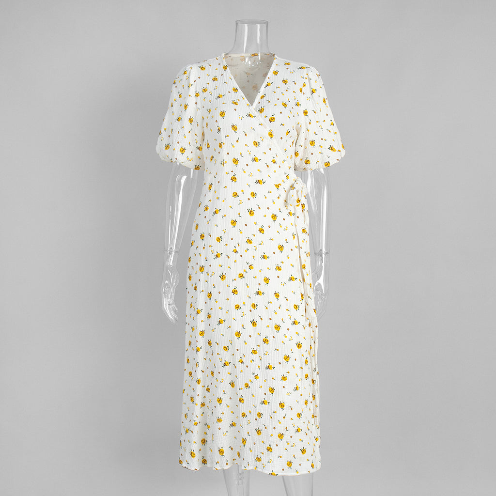 Cotton Floral Puff-Sleeve Wrap Midi Dress in Yellow Floral — front on mannequin