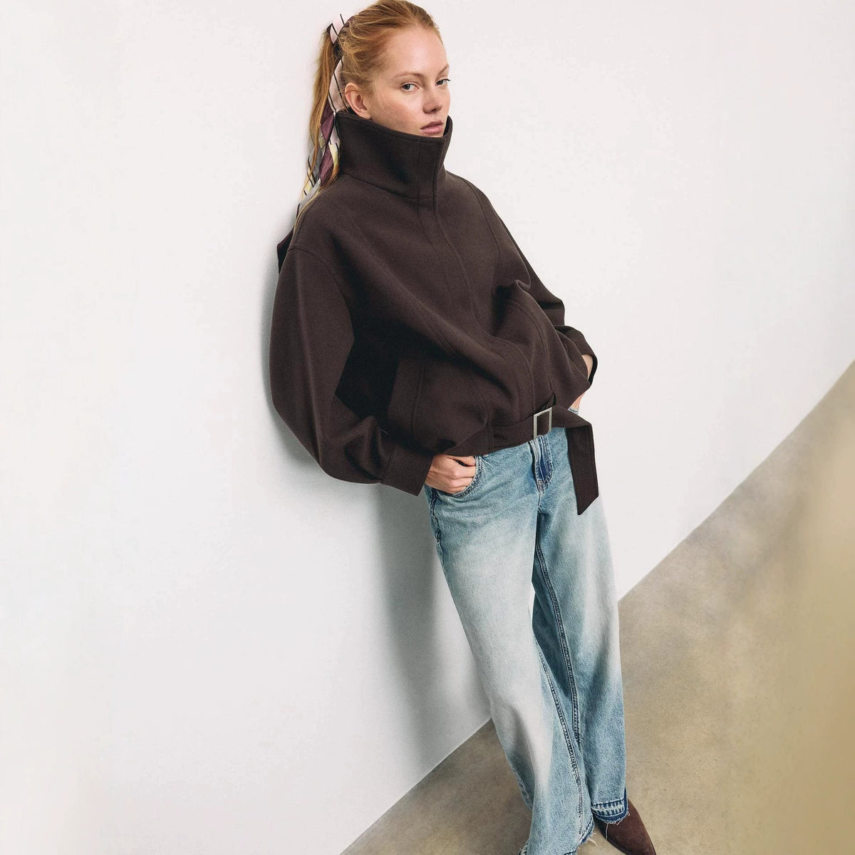 Funnel Neck Wool-Look Jacket with Buckle Hem Strap in Dark Brown — on model, collar up