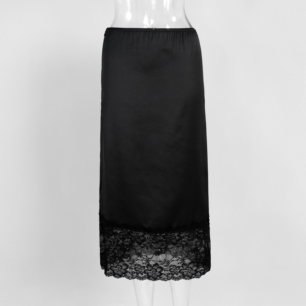 Satin Midi Skirt with Lace Hem in Black — front view on mannequin