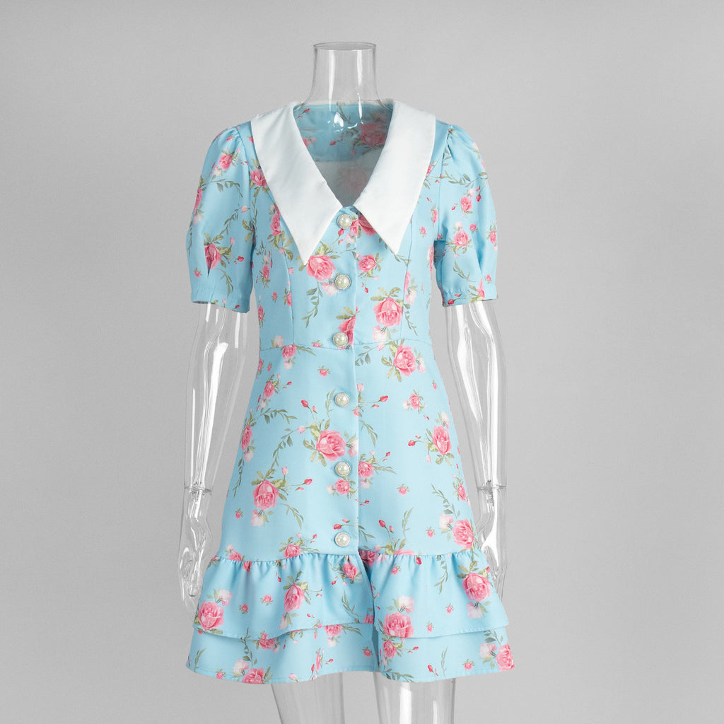 Floral Puff-Sleeve Mini Dress with Contrast Collar in Blue Floral — front view on mannequin