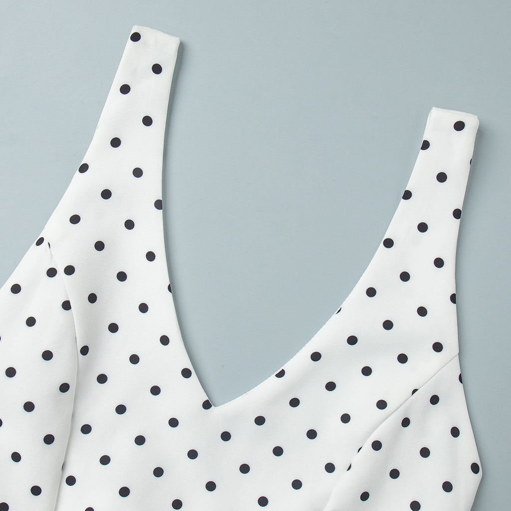 Polka Dot Halter Peplum & Wide-Leg Set in White Dot — close-up of the polka-dot fabric