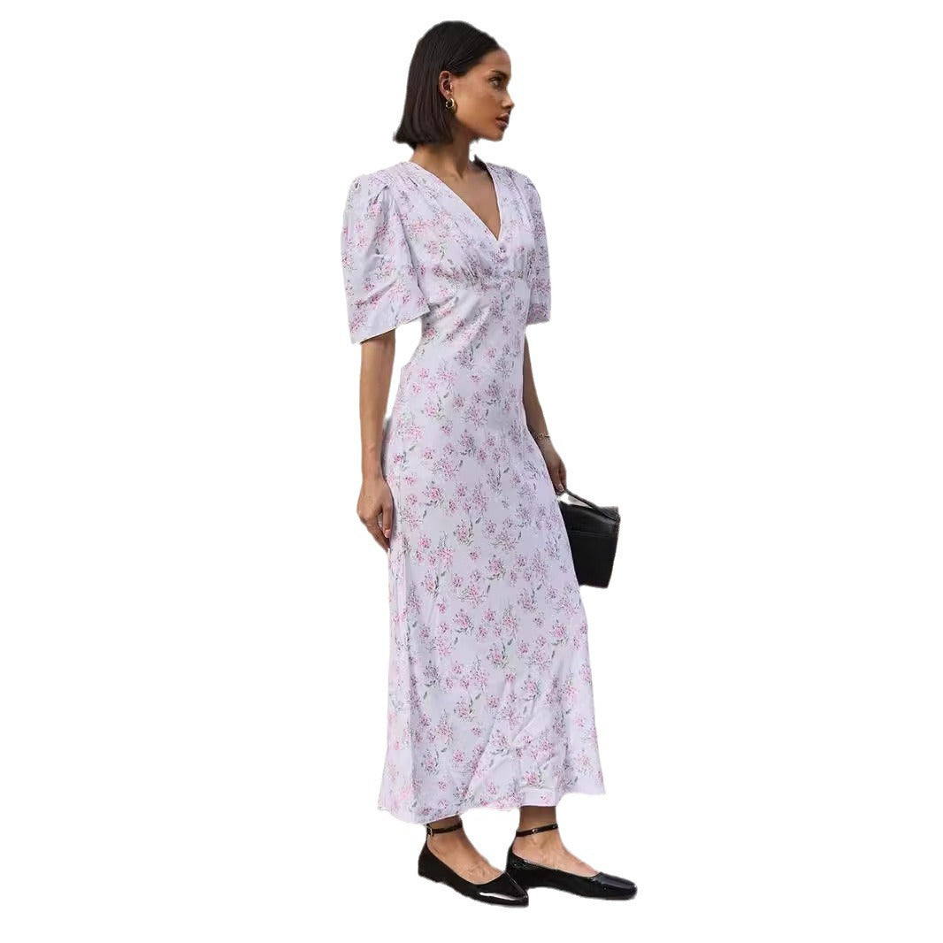 Floral Puff-Sleeve V-Neck Maxi Dress in White Floral — side view on model, full length