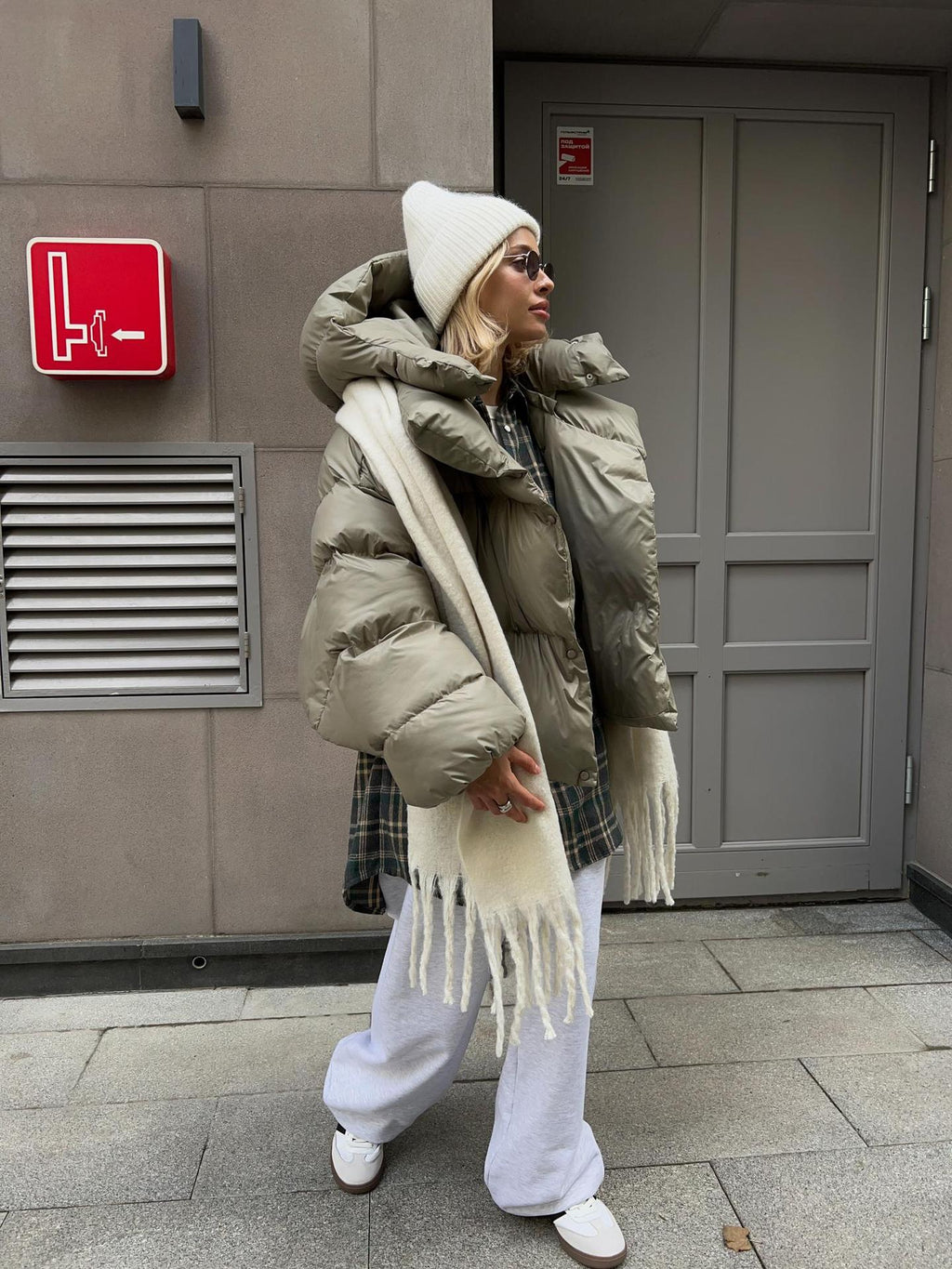 Cropped Hooded Puffer Jacket with Drawstring Hem in Sage Green — full-length view on model