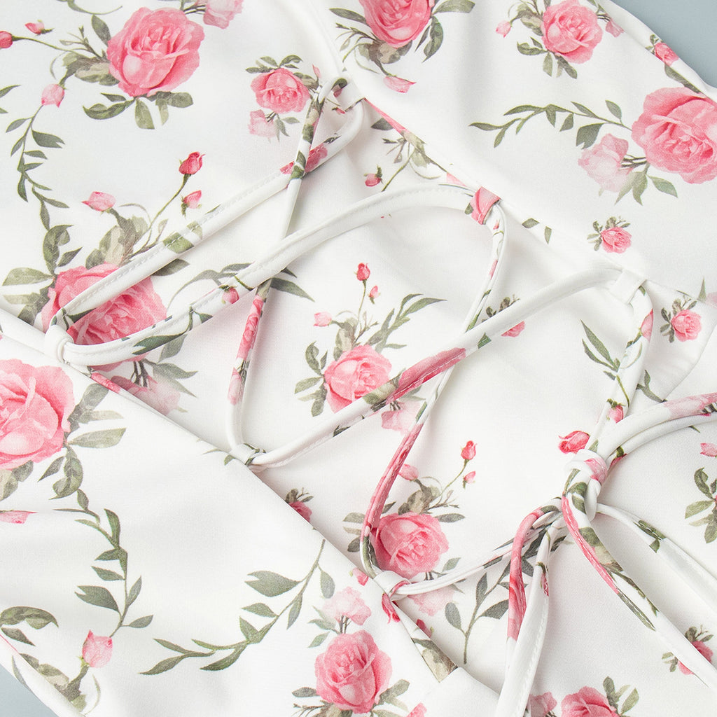 Floral Puff-Sleeve Mini Dress with Contrast Collar in Cream Floral — close-up of the back lace-up