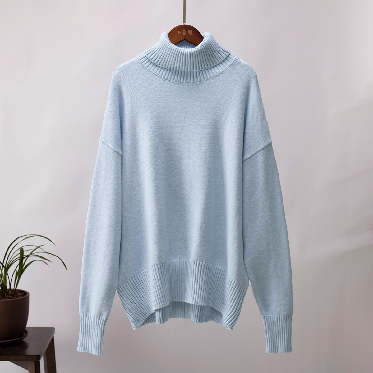 Oversized Knit Turtleneck Sweater in Powder Blue — front view
