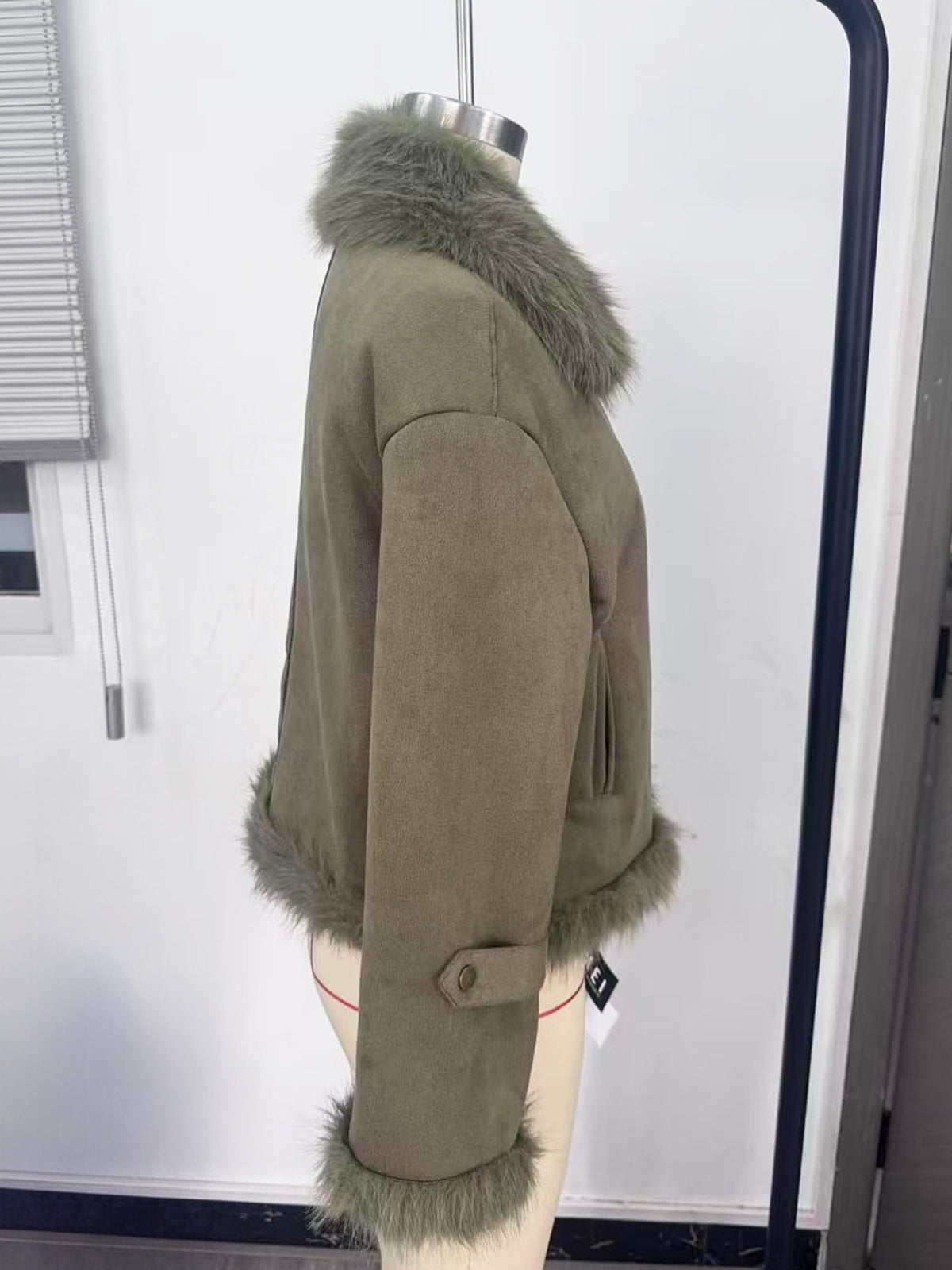 Cropped Faux Suede Shearling Jacket with Faux Fur Collar in Olive — back view on a dress form