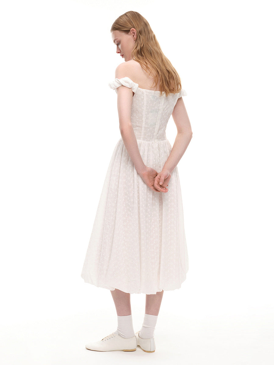 Eyelet Cotton Off-Shoulder Midi Dress in Ivory Eyelet — back view on model, studio