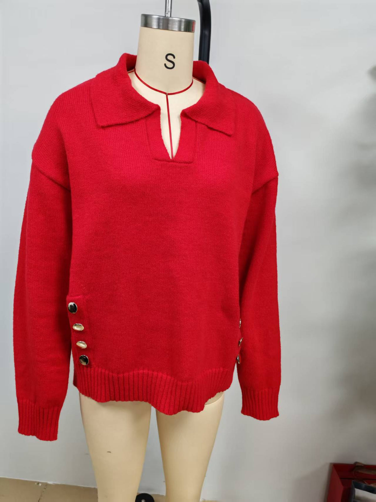 Collared Sweater with Side Buttons in Red — front view on a dress form