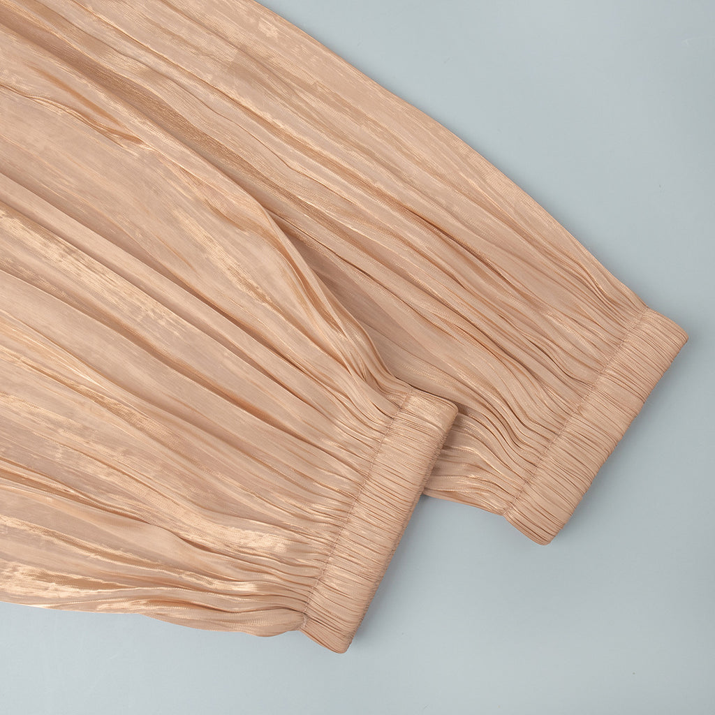Shiny Pleated Harem Pants with Elastic Cuffs in Champagne — close-up of the ankle cuff