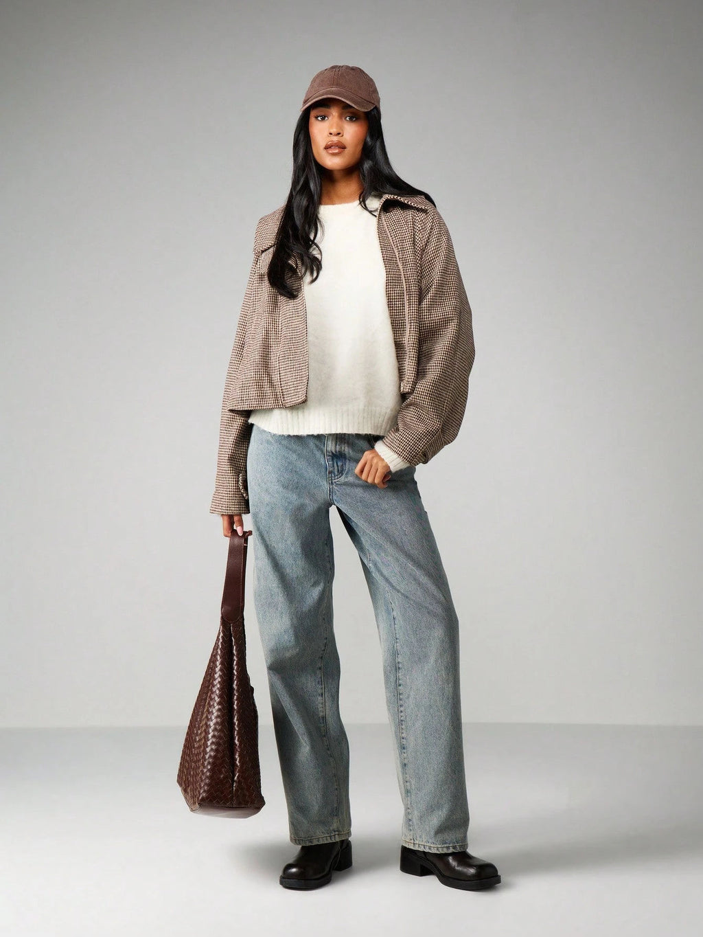 Cropped Houndstooth Jacket with Buttoned High Collar in Brown Houndstooth — full-length view on model with jeans