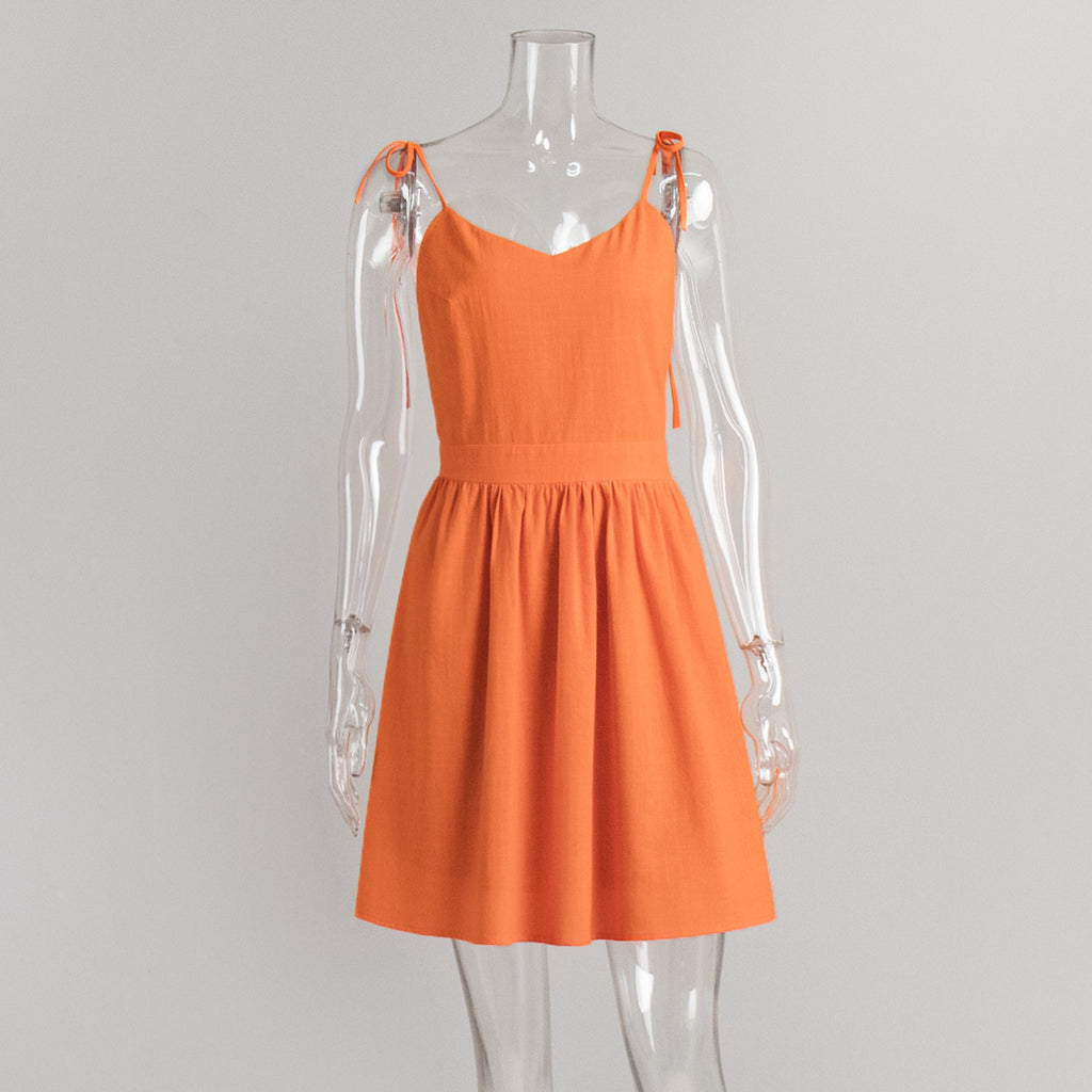 Tie-Shoulder Open-Back Cotton Mini Dress in Bright Orange — front view on mannequin