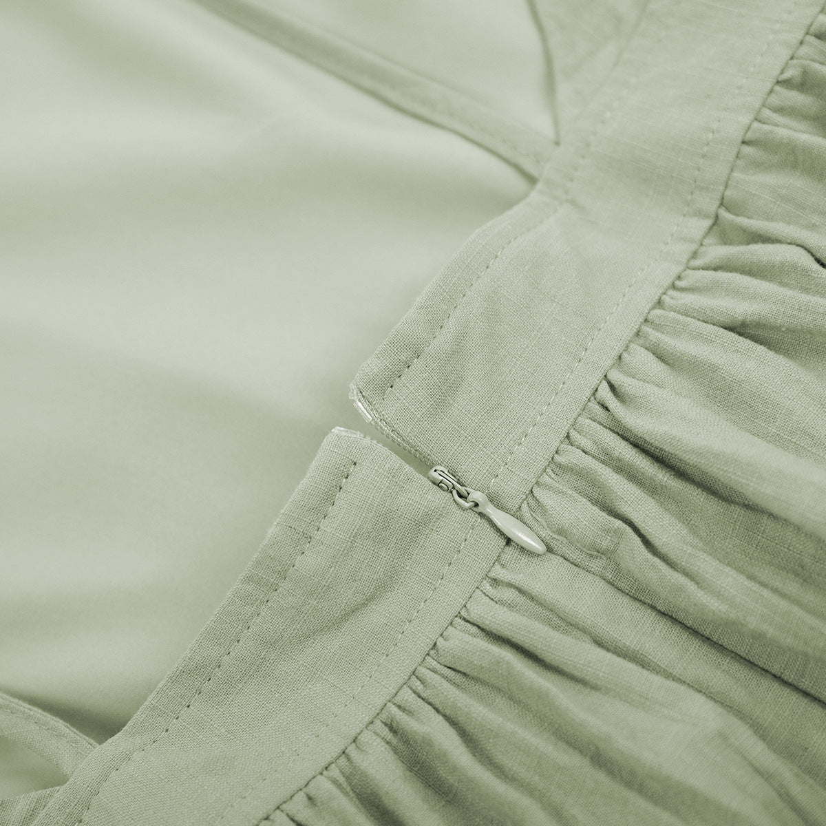 Tie-Shoulder Open-Back Cotton Maxi Dress in Sage Green — close-up of open back