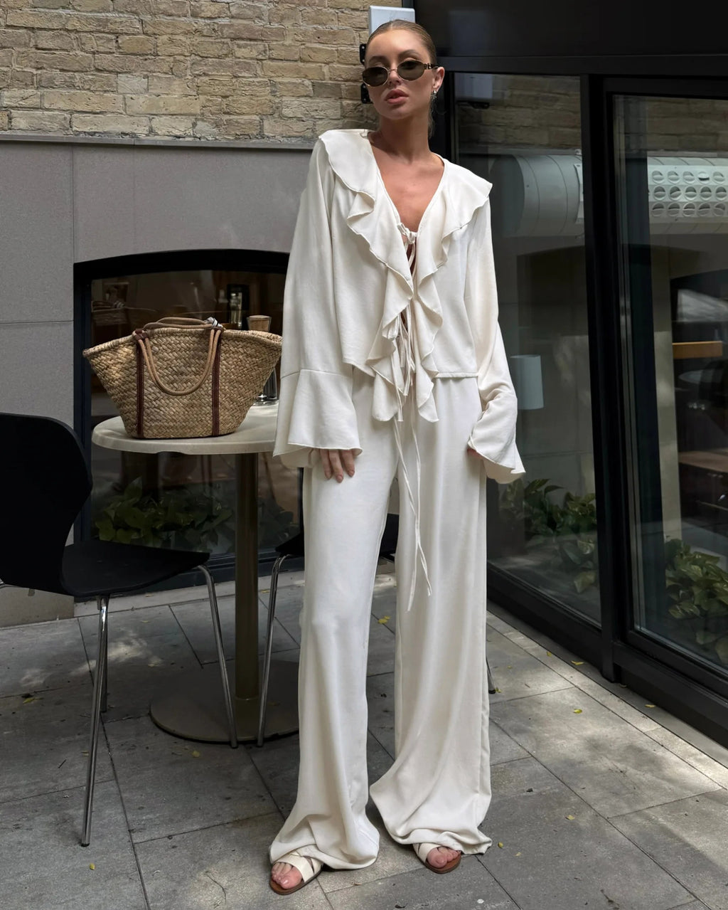 Ruffle Tie-Front Blouse and Wide-Leg Pants Set in Cream — full-length view on model