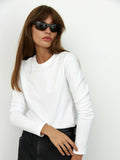 Everyday Cotton Crew Neck Long Sleeve Tee in White — front view on model