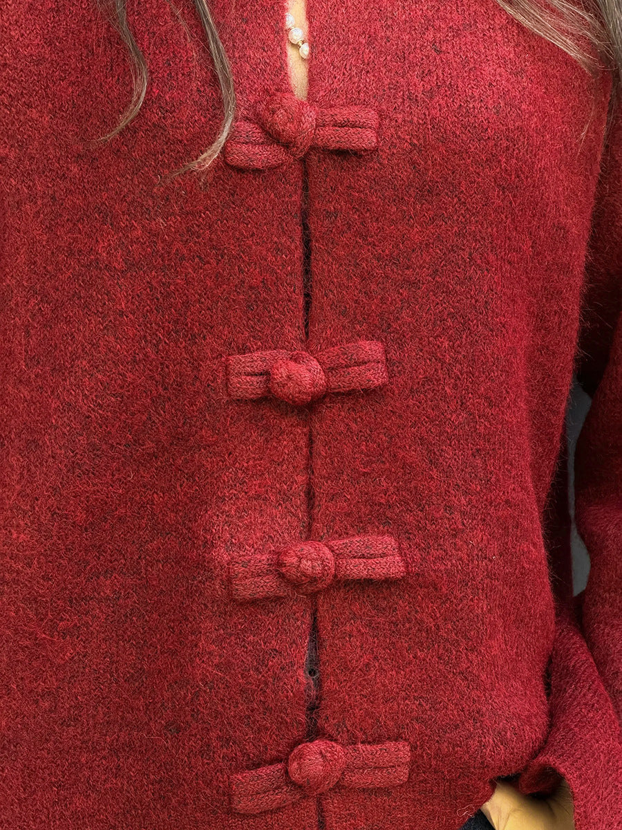 Boxy Knot-Button Crew Neck Cardigan in Red — close-up of the knotted loop buttons