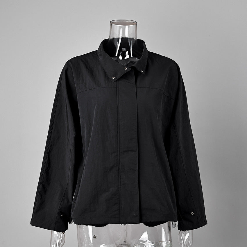 Oversized Stand-Collar Nylon Jacket with Drawcord Hem in Black — front view on mannequin