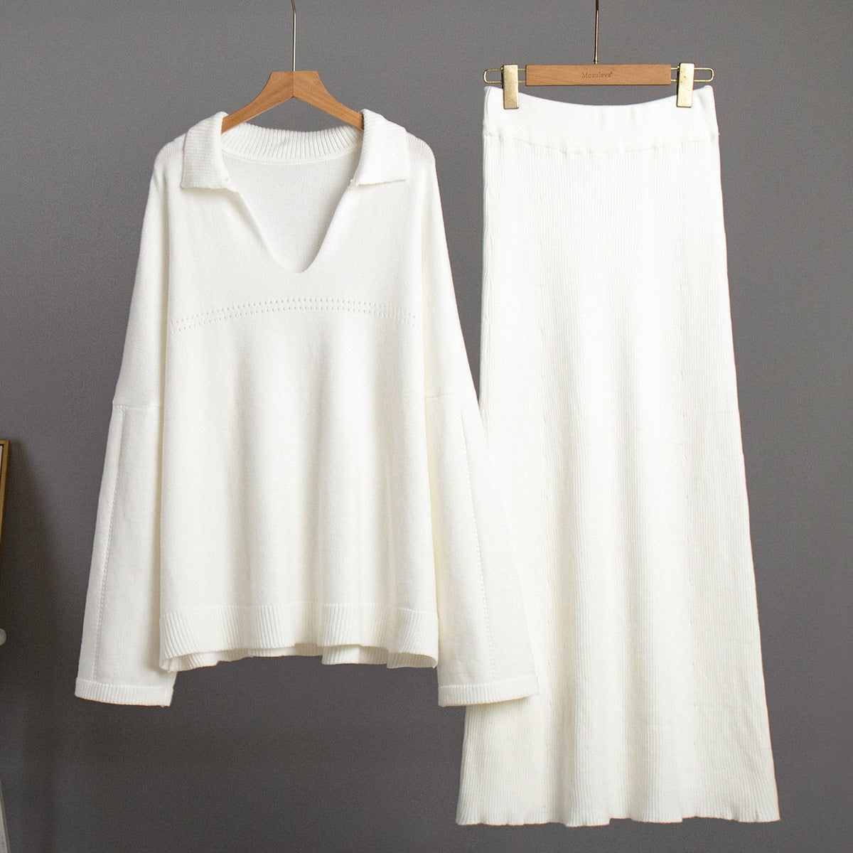 Oversized Collared V-Neck Sweater & Knit Maxi Skirt Set in White — set on hanger