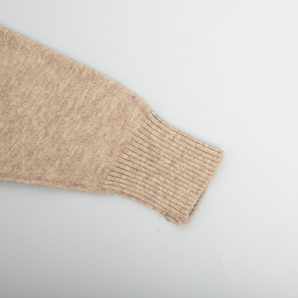Oversized Turtleneck Sweater & Wide-Leg Knit Pants Set in Camel — close-up of the ribbed cuff