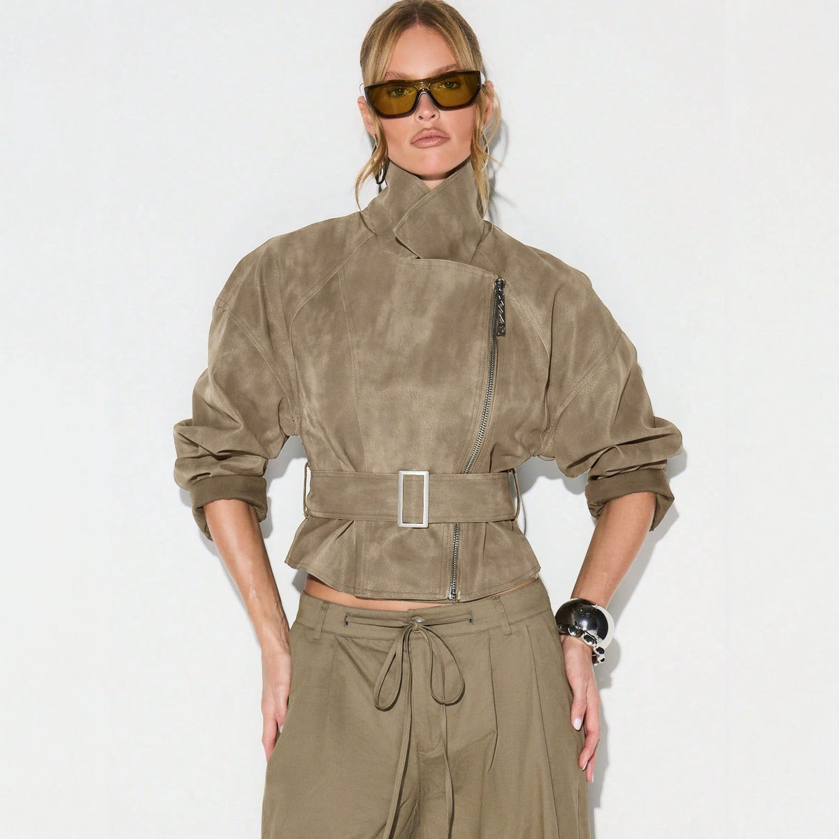 Belted Faux Suede Moto Jacket with Asymmetric Zip in Khaki — front view on model, zipped and belted