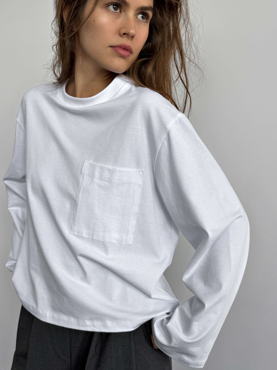 Relaxed Cotton Long-Sleeve Pocket Tee in White — front view on model