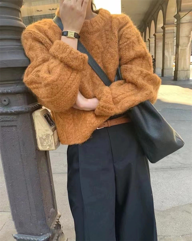 Chunky Cable-Knit Crew-Neck Sweater in Burnt Orange — side view on model