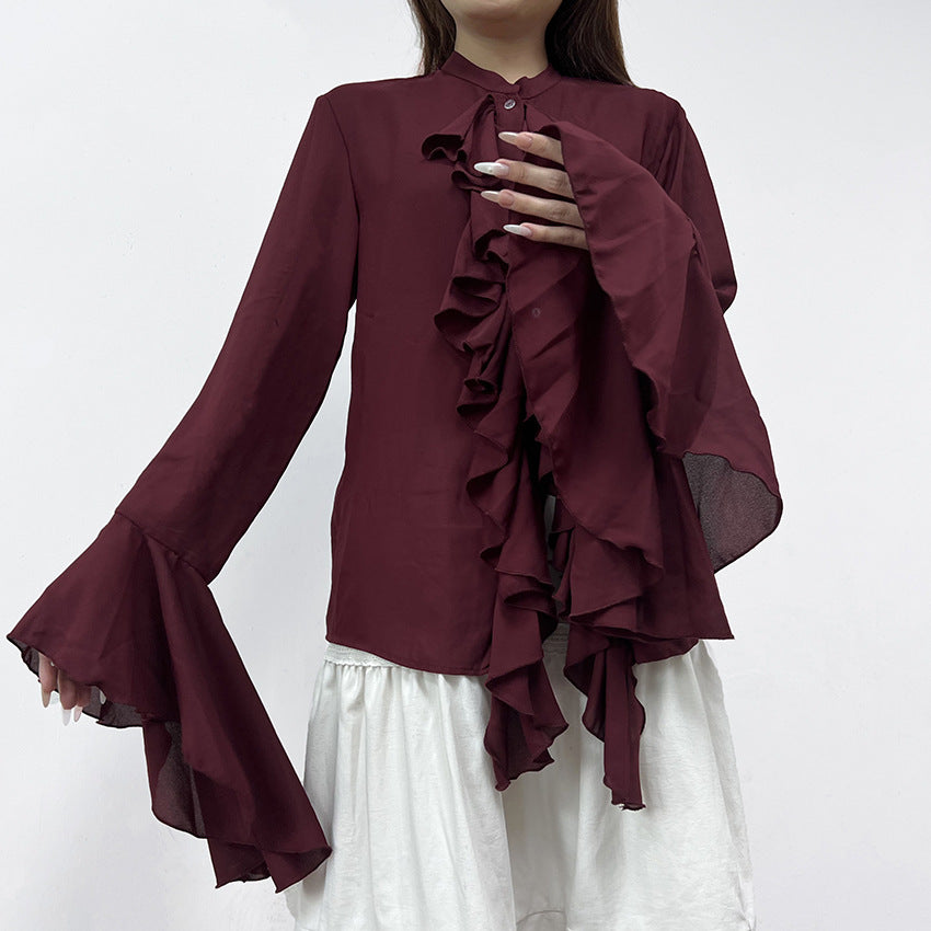 Cascading Ruffle Blouse with Bell Sleeves in Burgundy — front view on model