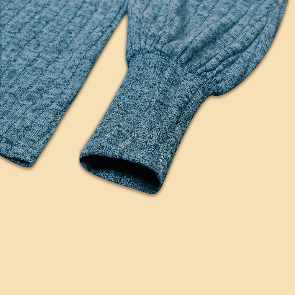 Ribbed Scoop-Neck Balloon-Sleeve Knit Top in Dusty Blue — close-up of the fitted cuff