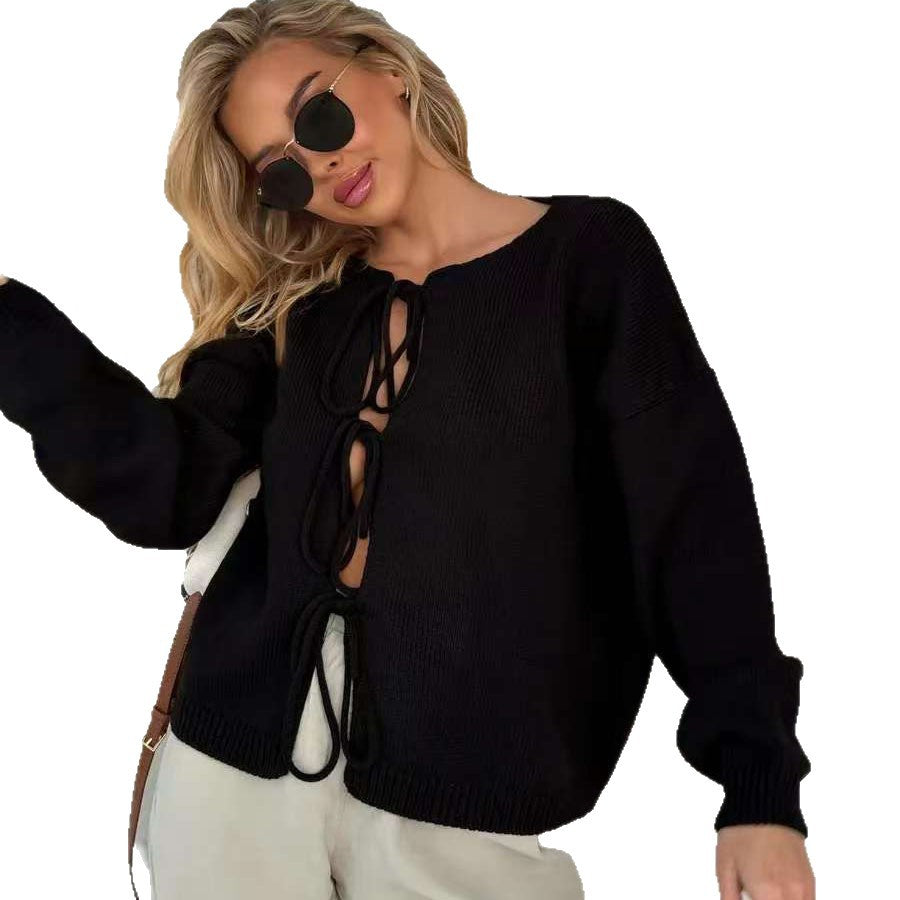 Round Neck Tie-Front Knit Cardigan in Black — front view on model