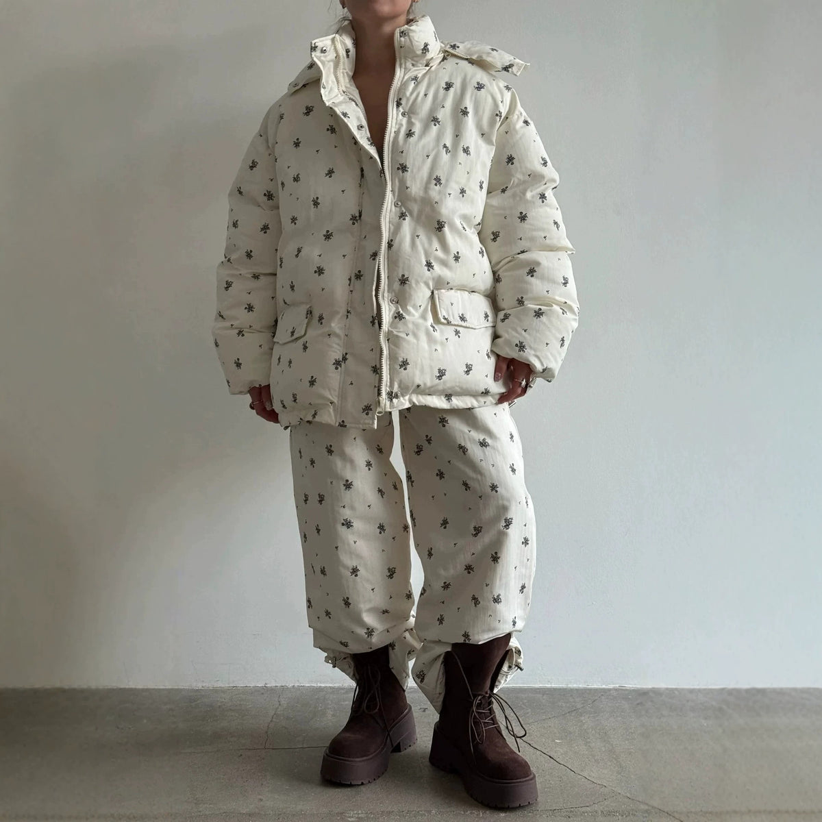 Floral Print Hooded Puffer Jacket & Drawstring Puffer Pants in Ivory Floral — matching set with lace-up boots, front