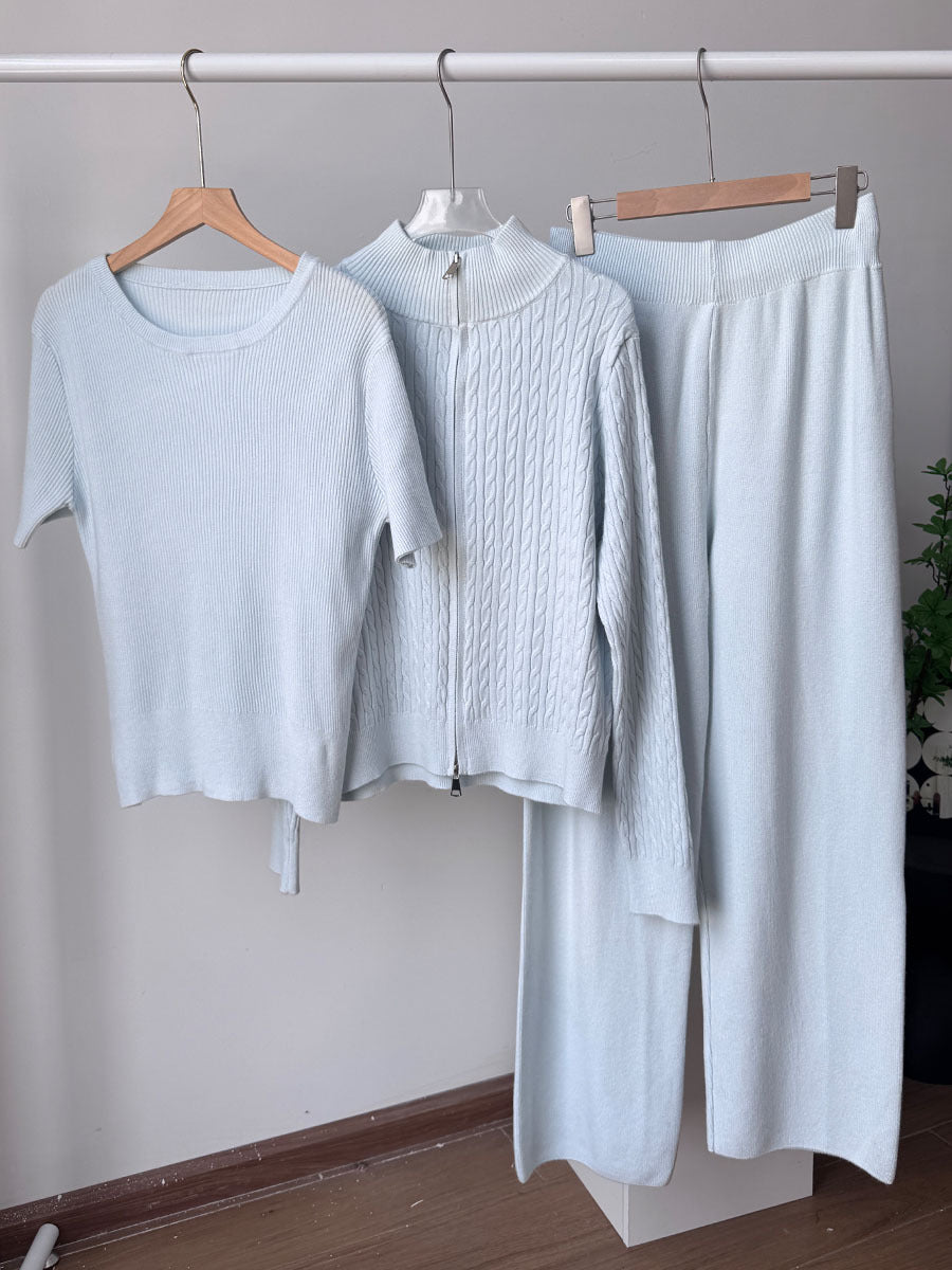 Three-Piece Cable Knit Cardigan Top and Pants Set in Powder Blue — three pieces on hangers