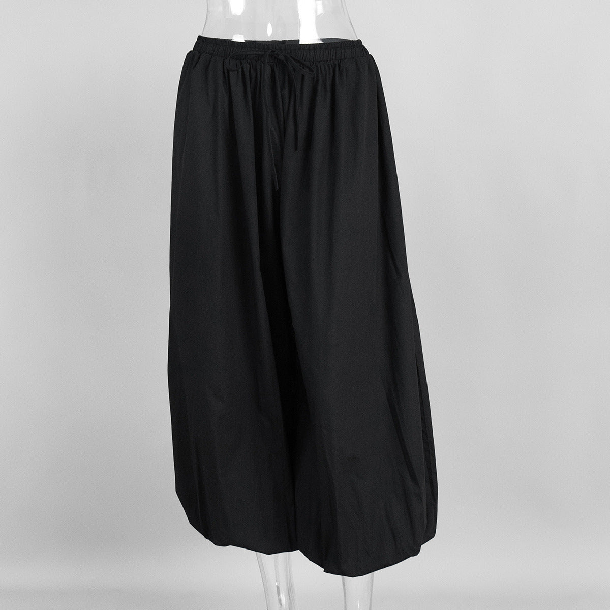 Cotton Balloon Lantern Pants in Black — front view on mannequin