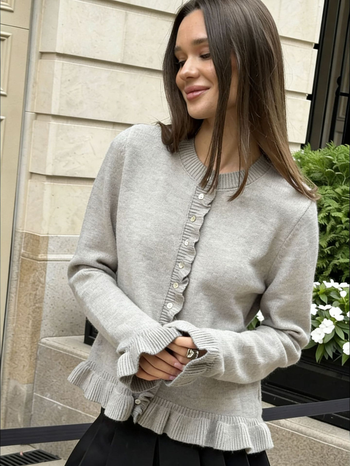 Ruffle-Trim Button-Front Knit Cardigan in Stone — front view on model