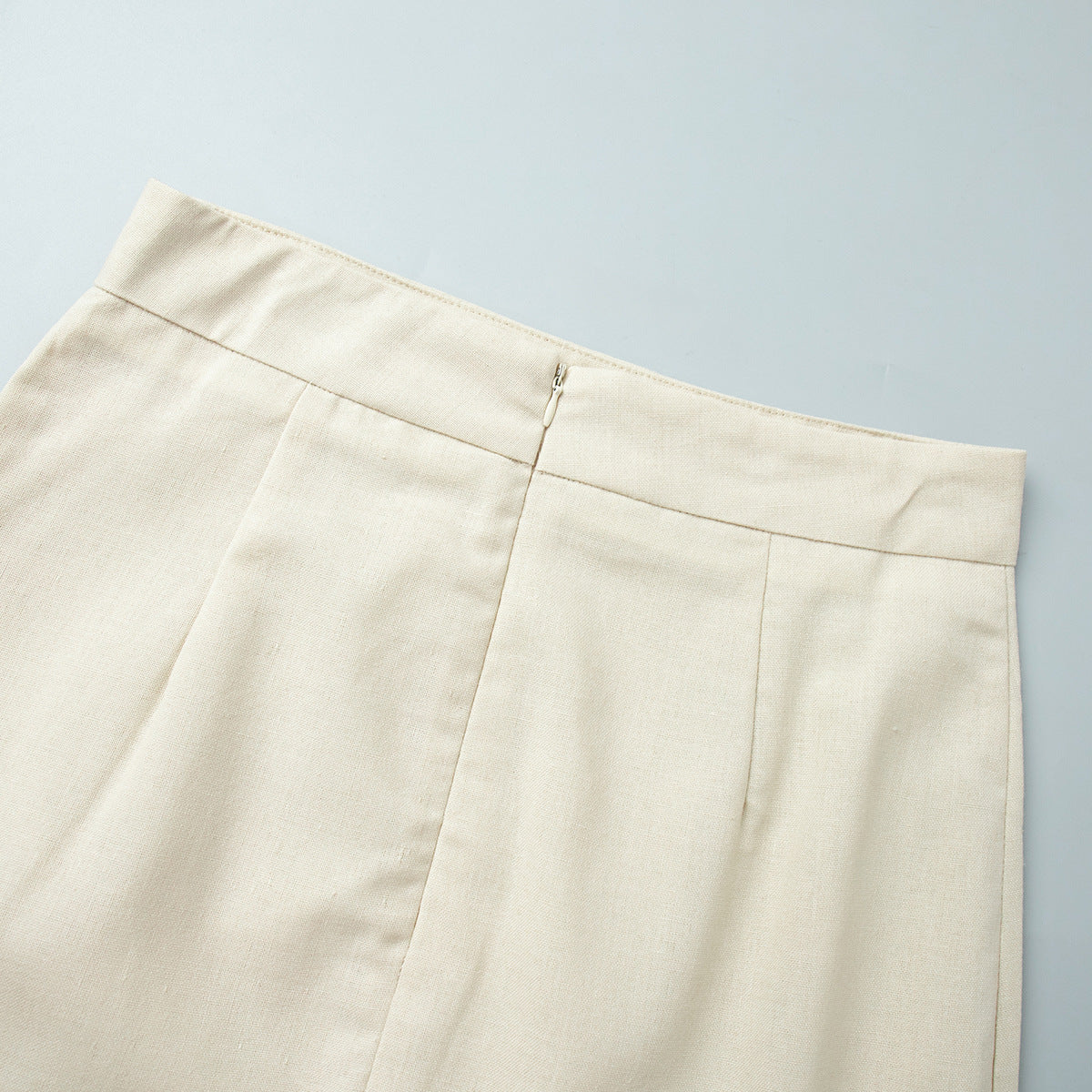 Linen-Blend Vest & Column Maxi Skirt Set in Cream — close-up of skirt back waistband