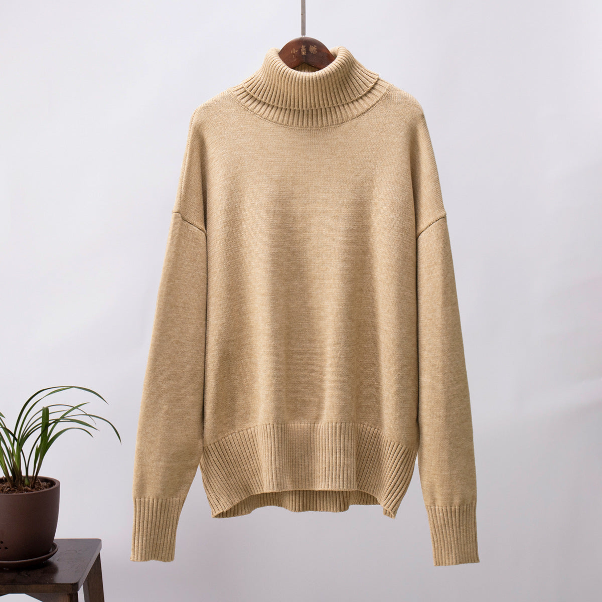 Oversized Knit Turtleneck Sweater in Camel — front view