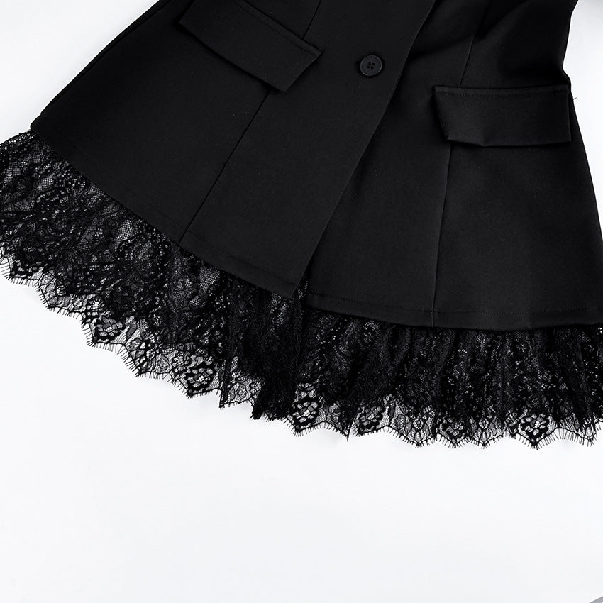 Fitted Blazer with Lace-Trimmed Hem and Cuffs in Black — close-up of the lace hem