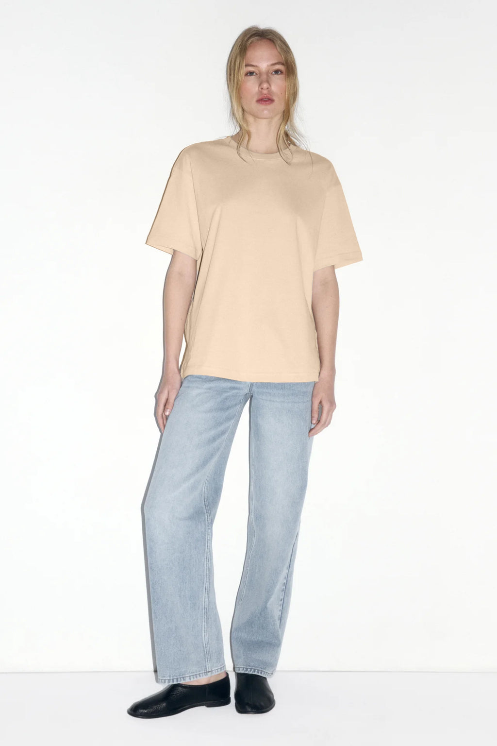 Relaxed Cotton Crew-Neck Tee in Beige — full-length view on model with jeans