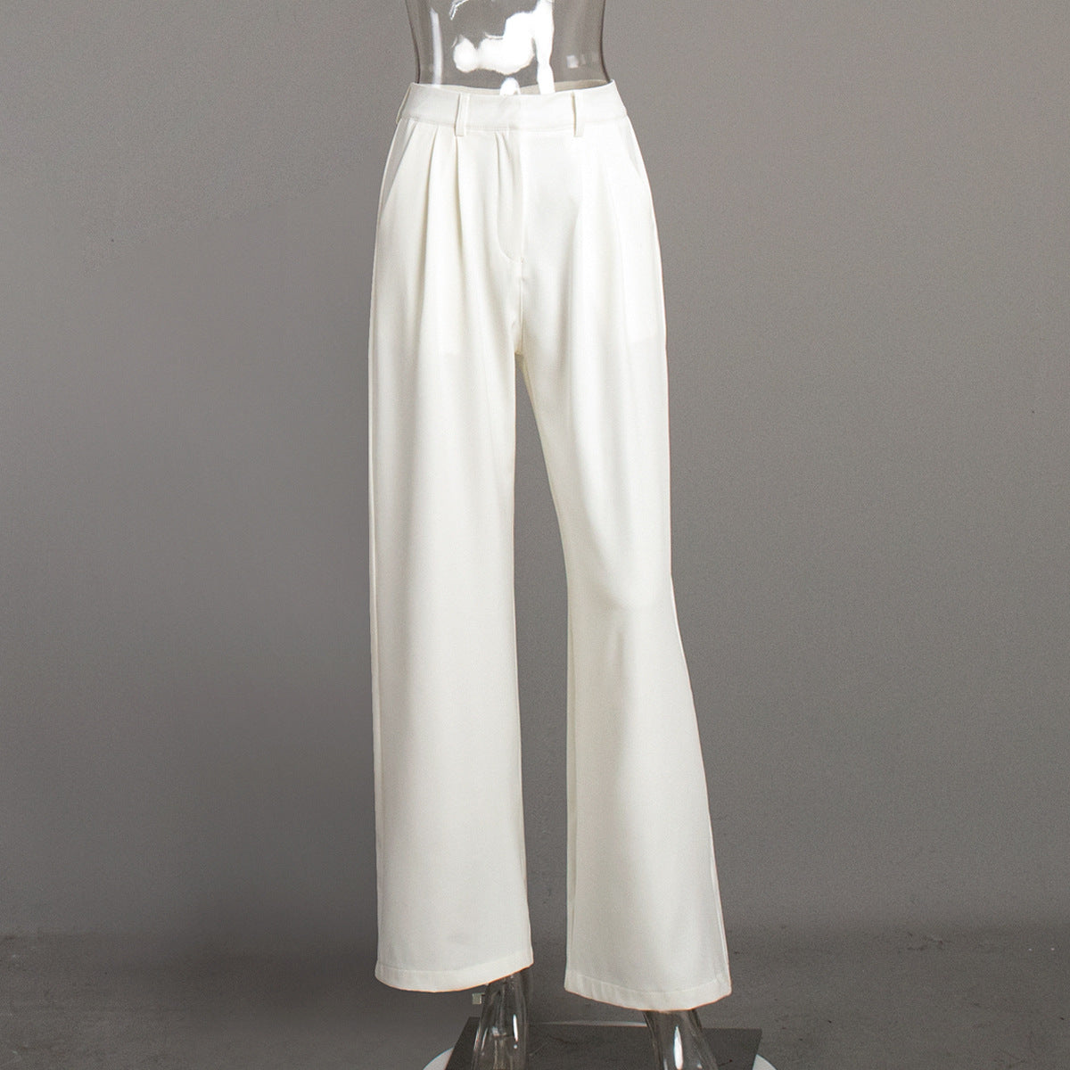 High-Waist Pleated Wide-Leg Trousers in White — front view on mannequin