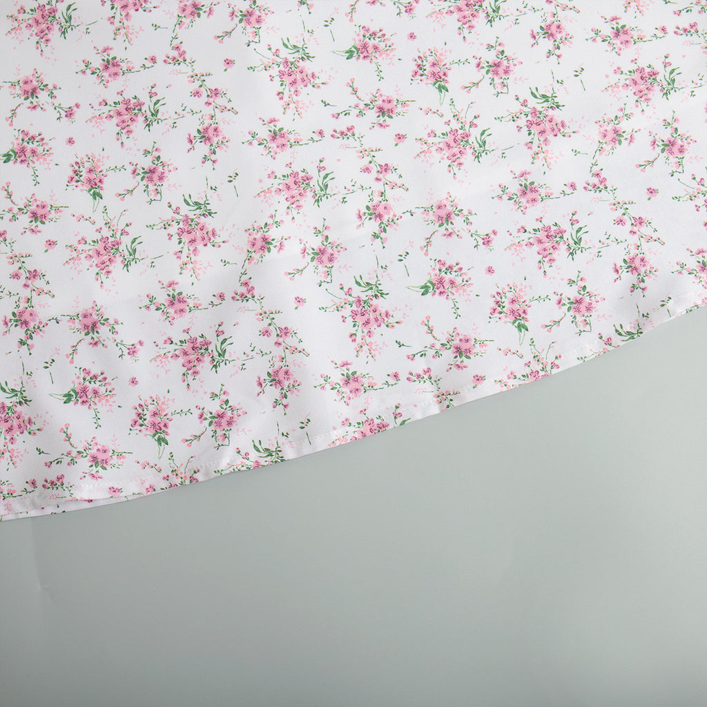 Floral Puff-Sleeve V-Neck Maxi Dress in White Floral — close-up of hem