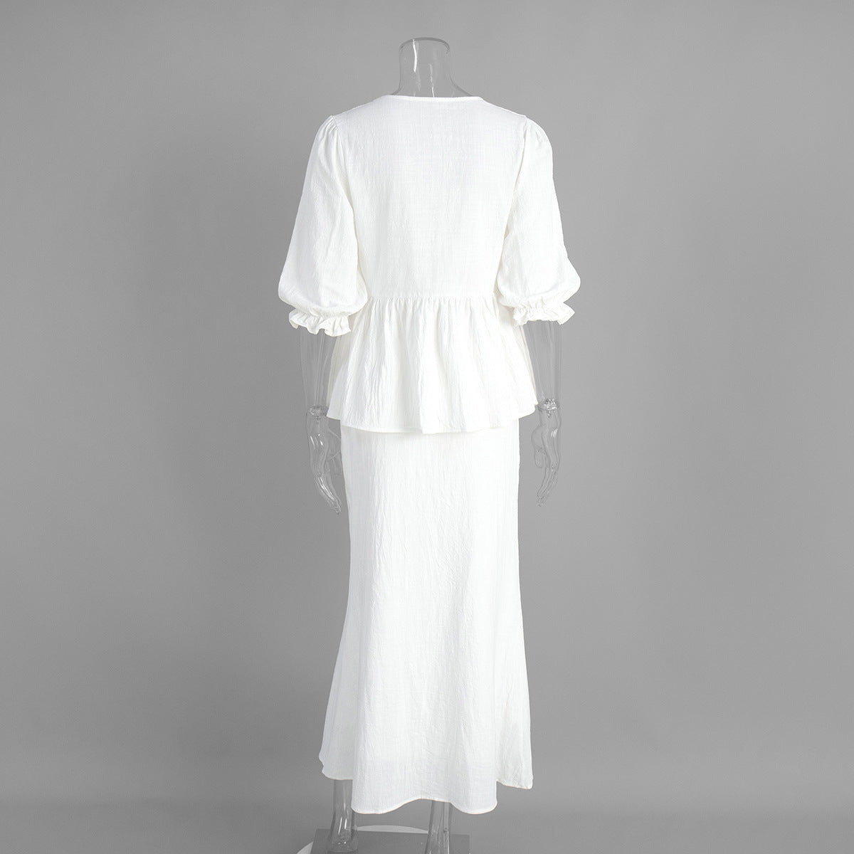 Tie-Front Puff-Sleeve Top & Maxi Skirt Set in White — back view on mannequin