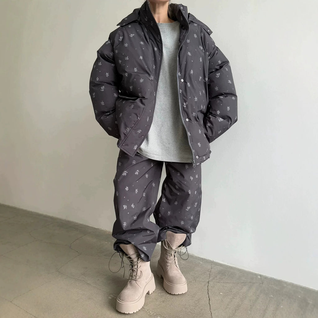 Floral Print Hooded Puffer Jacket & Drawstring Puffer Pants in Black Floral — jacket worn open over a gray tee with the pants