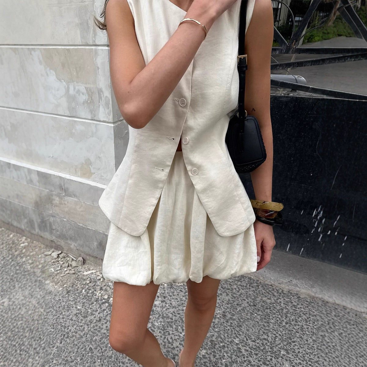 Cotton Peplum Vest & Bubble Mini Skirt Set in White — close-up on model