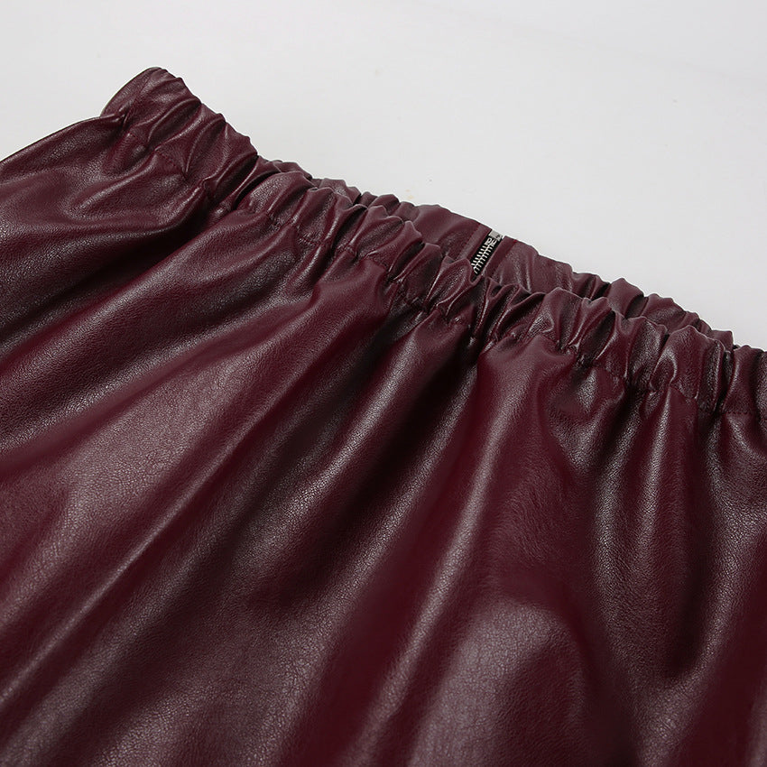 Faux Leather Bomber Jacket with Point Collar in Burgundy — close-up of the elasticated hem