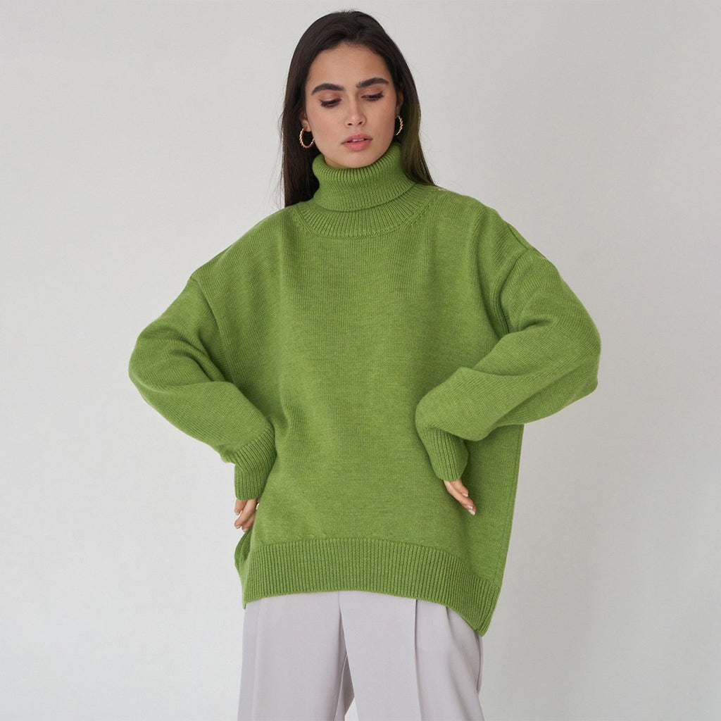 Oversized Knit Turtleneck Sweater in Apple Green — front view on model