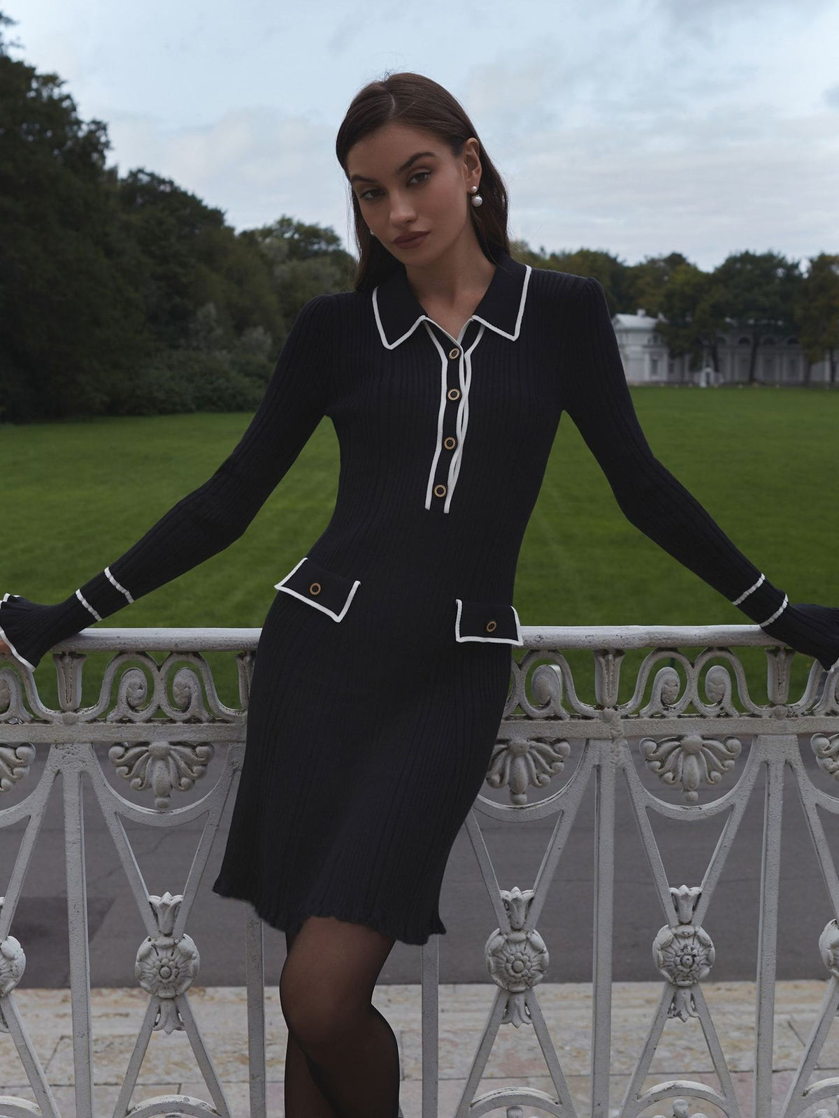 Contrast-Trim Collared Knit Mini Dress in Black — front view on model or garment