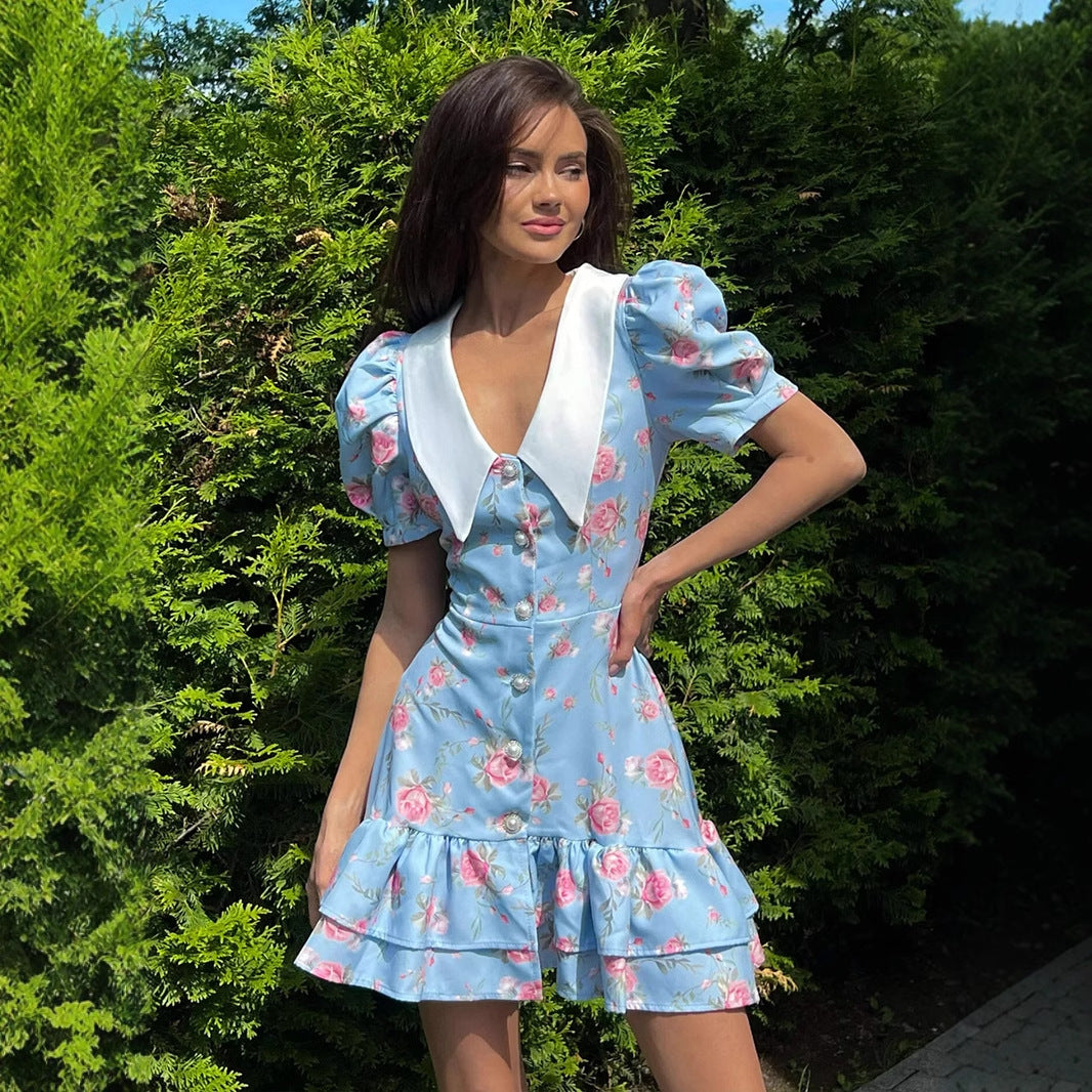 Floral Puff-Sleeve Mini Dress with Contrast Collar in Blue Floral — on model outdoors