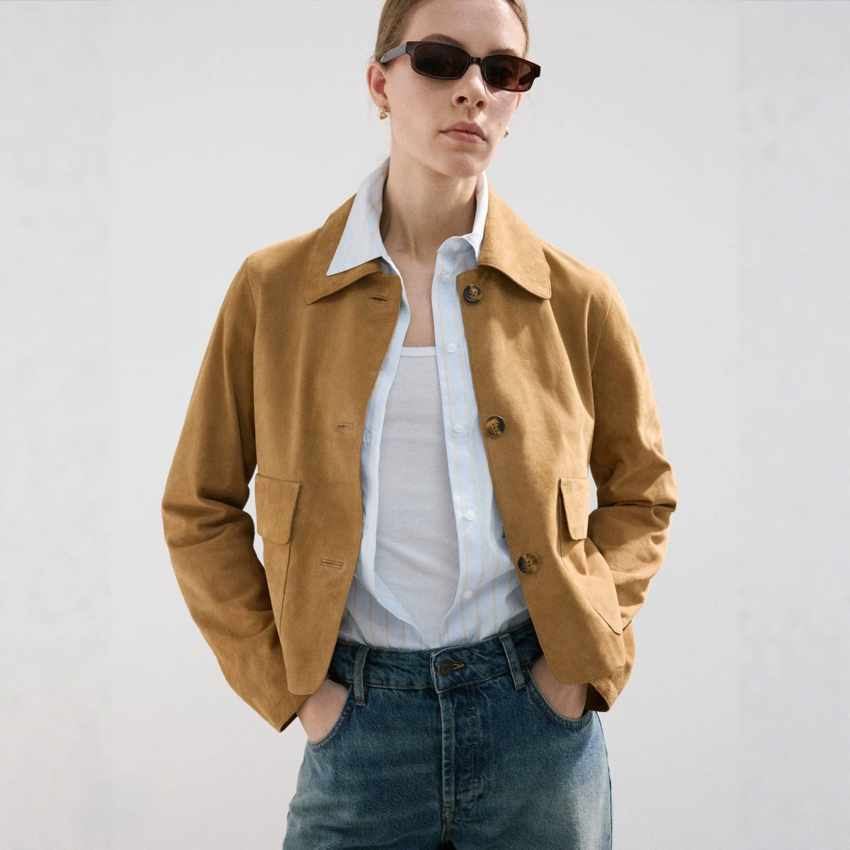 Cropped Faux Suede Jacket with Patch Pockets in Camel — front view on model