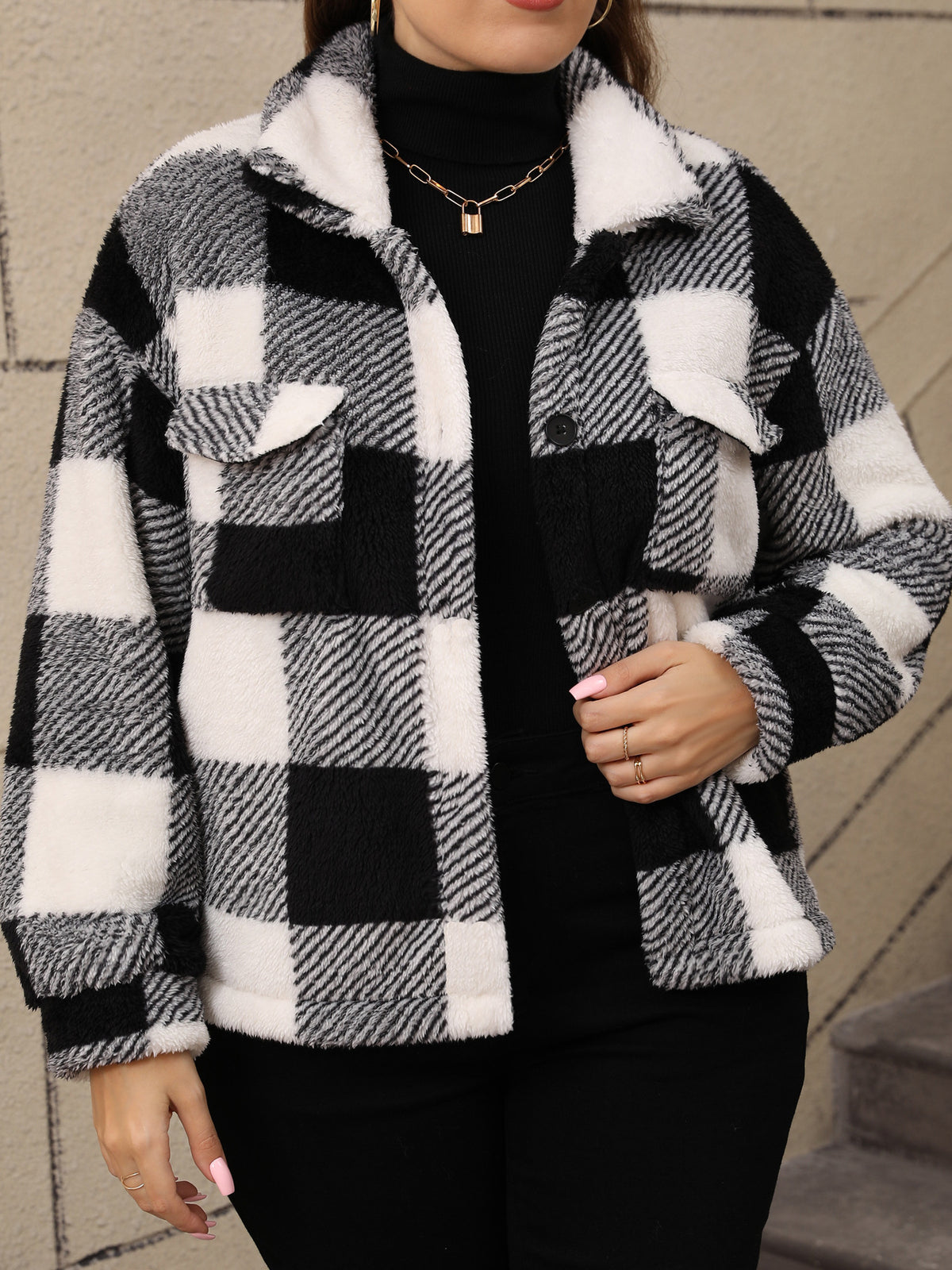 Plus-Size Buffalo Check Plush Shirt Jacket in Black & White Check — on model with a turtleneck
